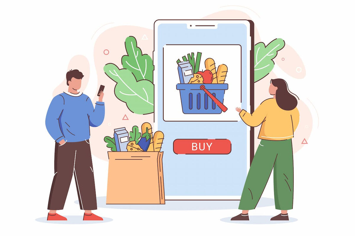 Consumatori che fanno la spesa di generi alimentari su smartphone, evidenziando il trend dell'acquisto digitale