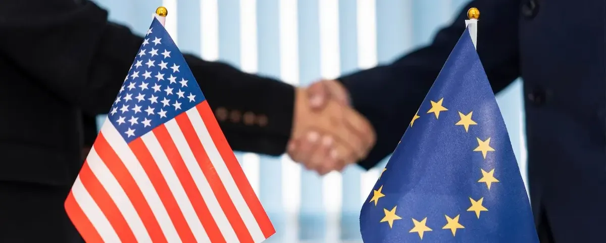 Icona: stretta di mano tra USA e EU, simboleggiando la cooperazione commerciale